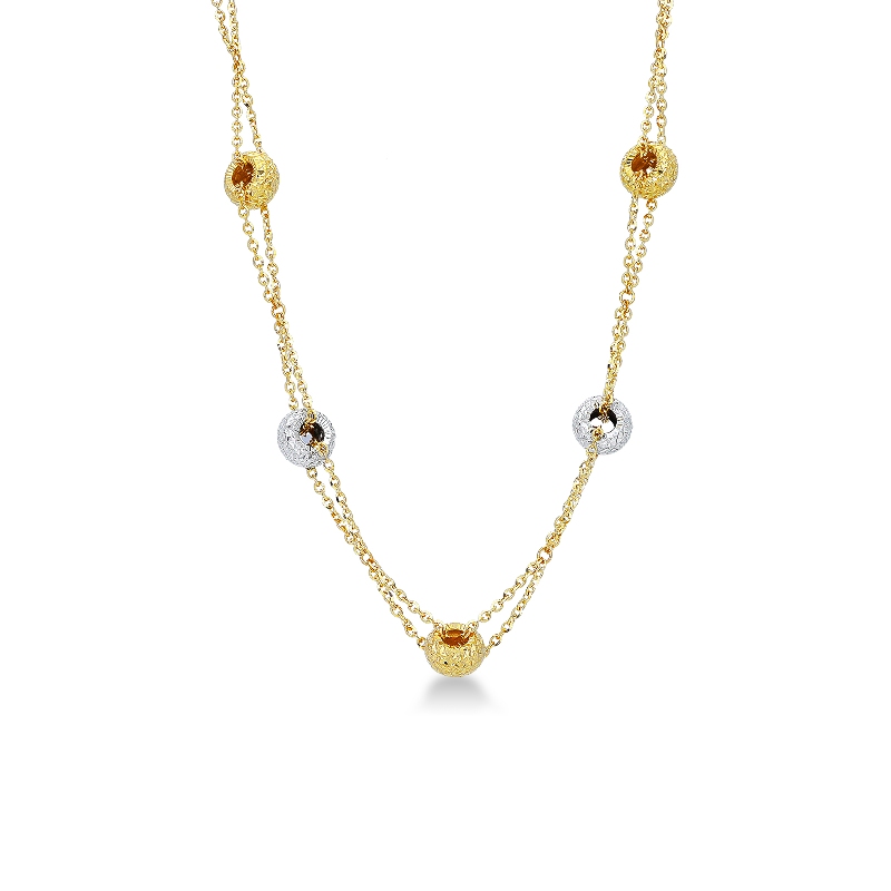 Chaîne en or jaune et or blanc 18k maillons en forme de petites boulles diamantée