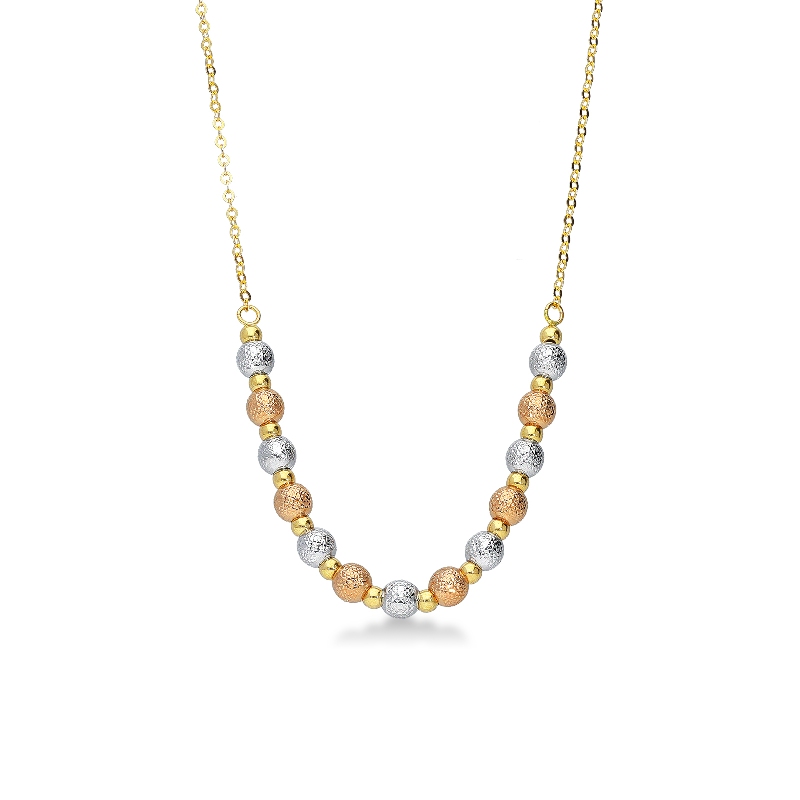Collier avec des billes de diamants en or blanc, jaune et rose 18k
