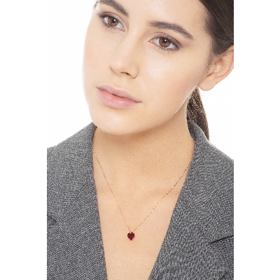 Collier en or rose 18k avec pendentif et zircon rouge