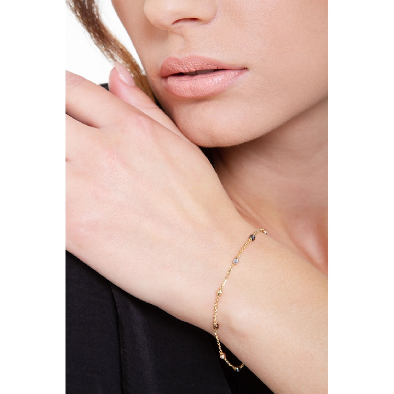 Bracelet en or18 carats avec billes de couleur.