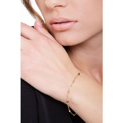 Bracelet en or18 carats avec billes de couleur.