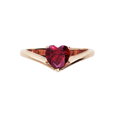 Bague en or rose 18K sertie d’un zircon rouge