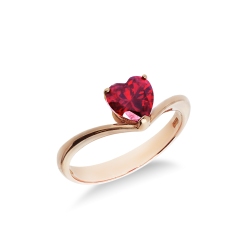 Bague en or rose 18K sertie d’un zircon rouge