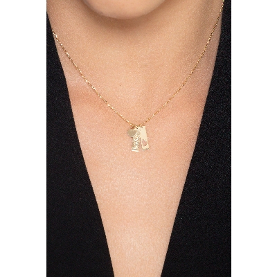 Collier en or jaune 18k avec trois breloques