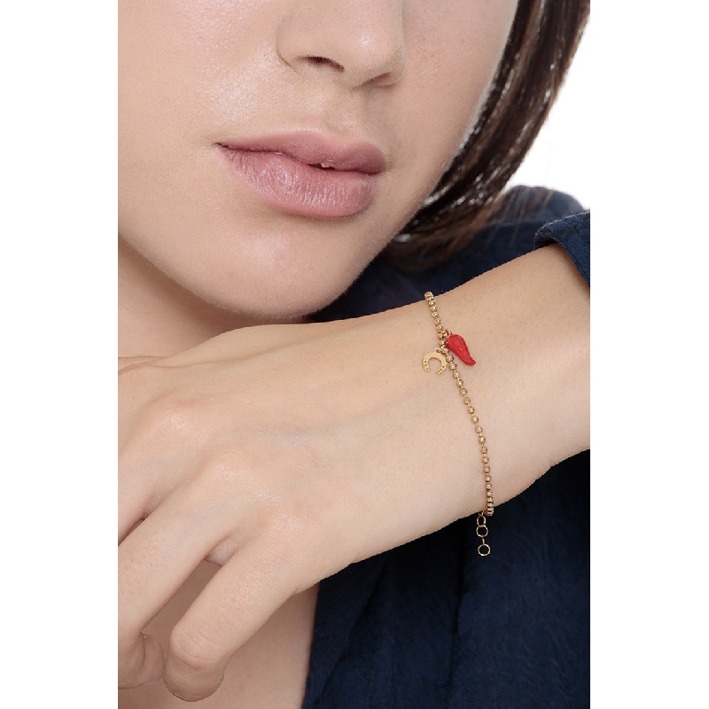 Bracelet en or 18K avec fer à cheval et corne rouge porte-bonheur