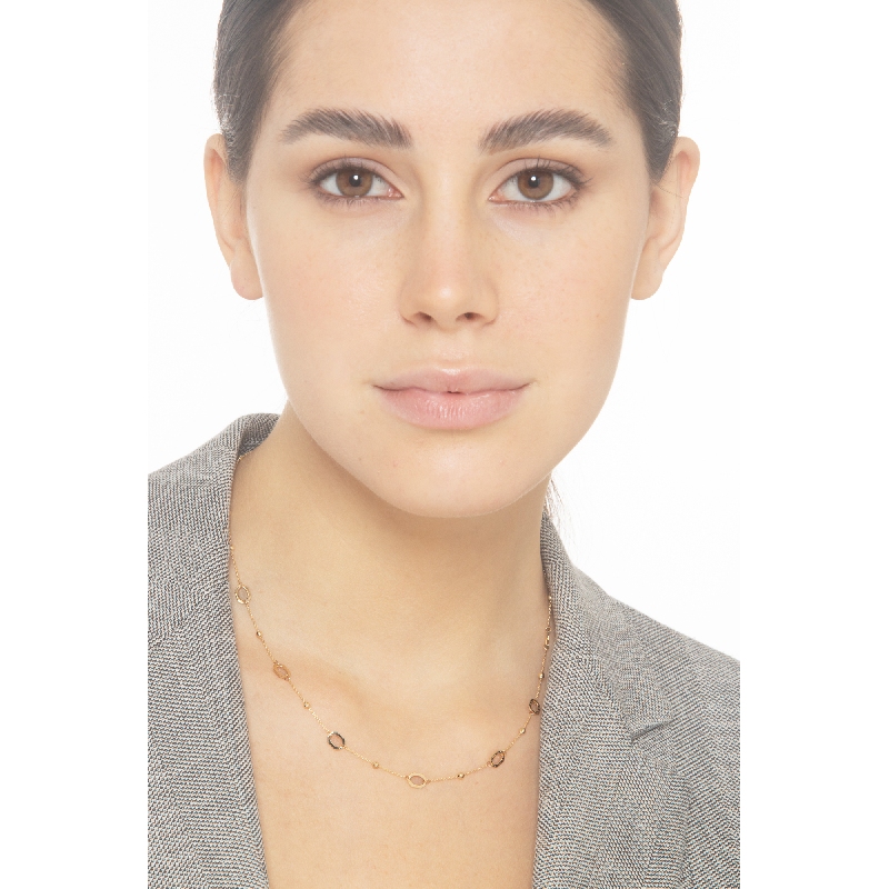 Collier en or jaune 18k avec perles et anneaux