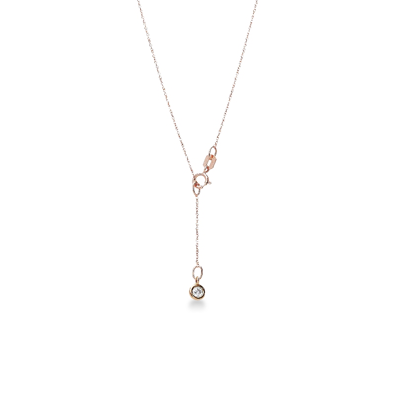 Collier en or rose avec pendentif cœur et zircones
