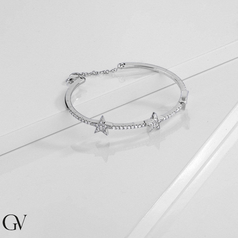 Bracelet or blanc 18k avec trois étoiles en diamants