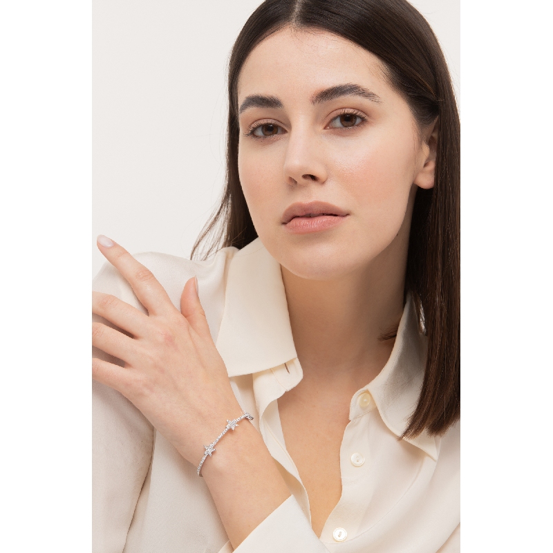 Bracelet or blanc 18k avec trois étoiles en diamants