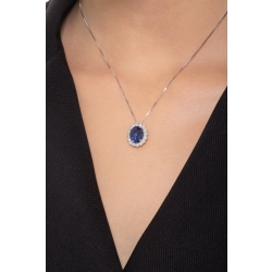 Pendentif en or blanc 18 ct avec saphir bleu taille ovale et halo diamants 2