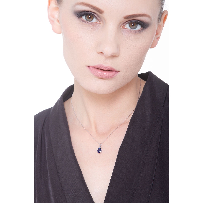 Chaîne en or blanc 18k avec diamant et saphir bleu