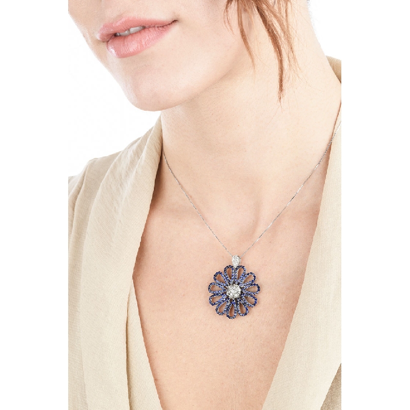 Collier en or blanc 18k avec fleur de saphirs bleus et diamants
