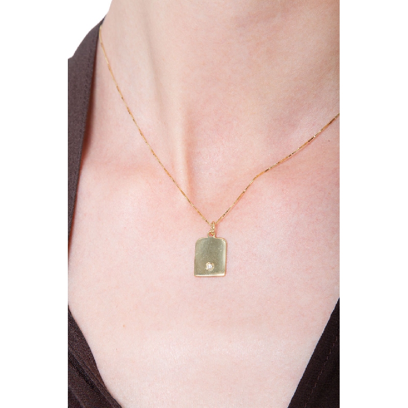 Collier médaille ronde en or jaune avec diamant