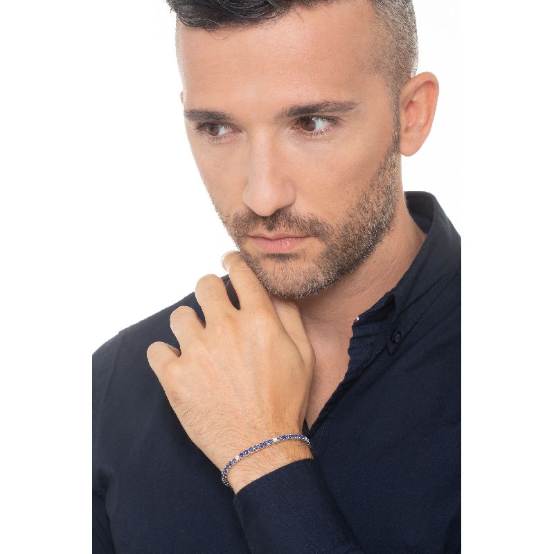 Bracelet tennis à griffes en or blanc 18 carats serti de saphirs bleus