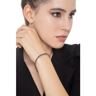 Bracelet tennis en or blanc 18k avec diamants noirs