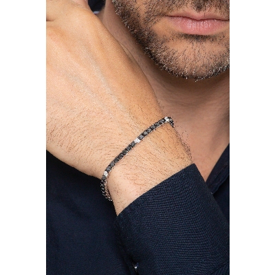 Bracelet tennis en or blanc 18k serti de diamants noirs alternés avec des diamants 