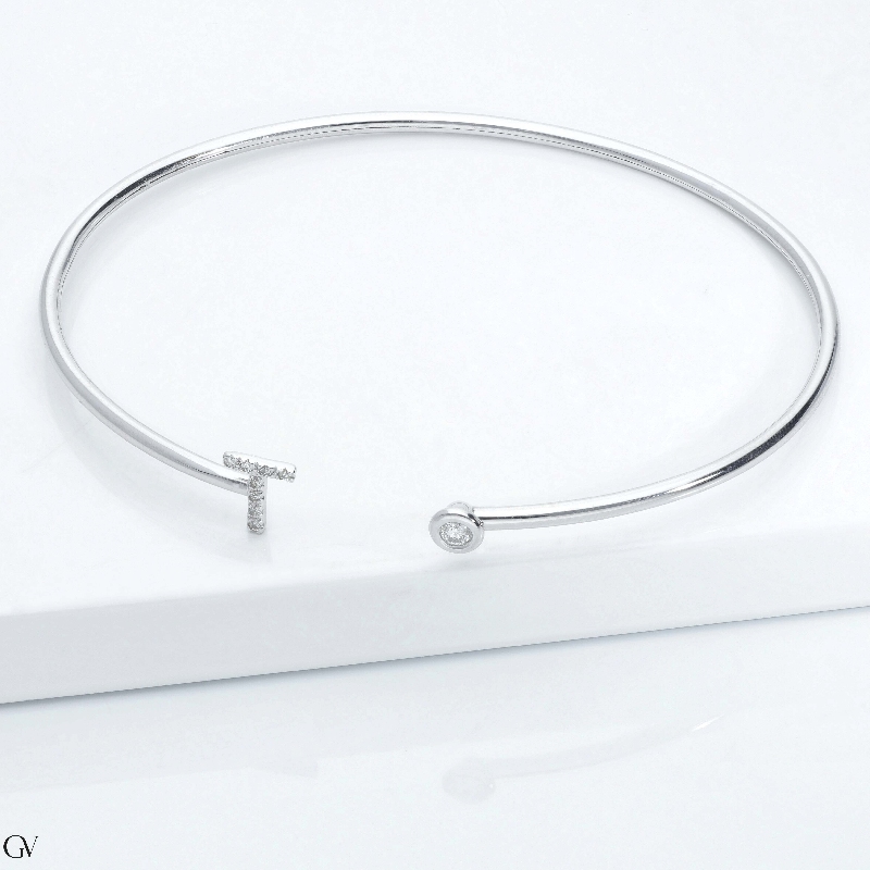 Bracelet rigide avec lettre  T en diamants et or blanc 750