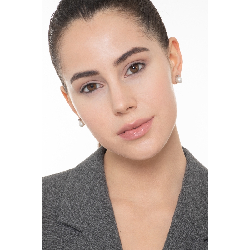 Boucles d'oreilles en or blanc 18k avec perle et un diamant