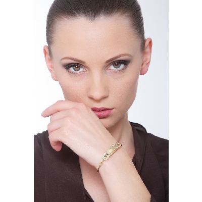 Bracelet avec plaque en or jaune 18 carats sertie de diamants