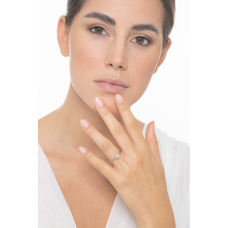 Bague solitaire diamant 0,70 ct or blanc 18k quatre griffes