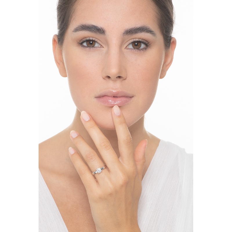 Bague solitaire ligne droite 4 griffes diamant 0.70 ct