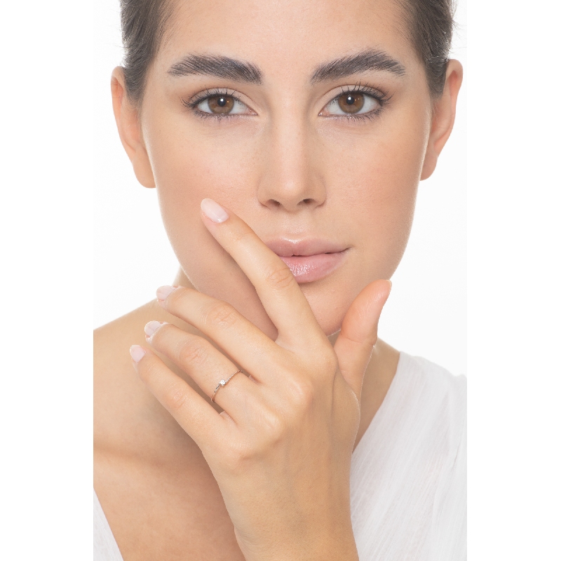 Bague solitaire en or blanc 18 carats avec diamant 0,04