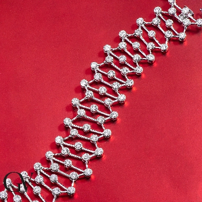 Bracelet en or blanc 18k avec chatons souples et diamants