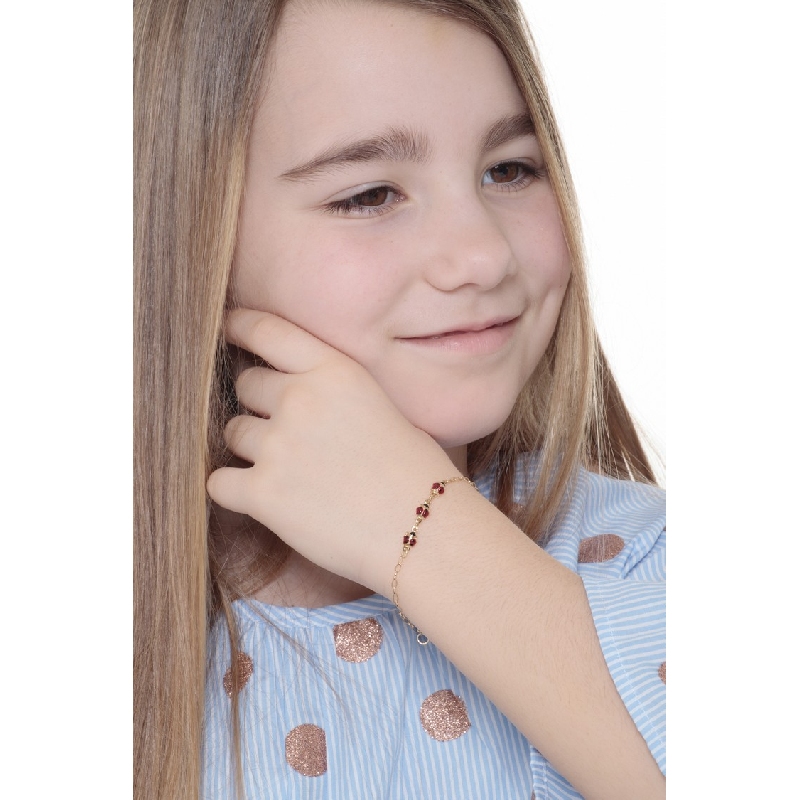 Bracelet enfant avec trois coccinelles émaillées en or jaune 18k