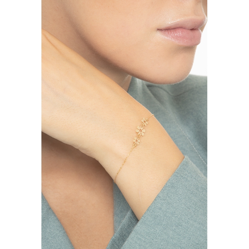 Bracelet en or jaune 18k trois fleurs 