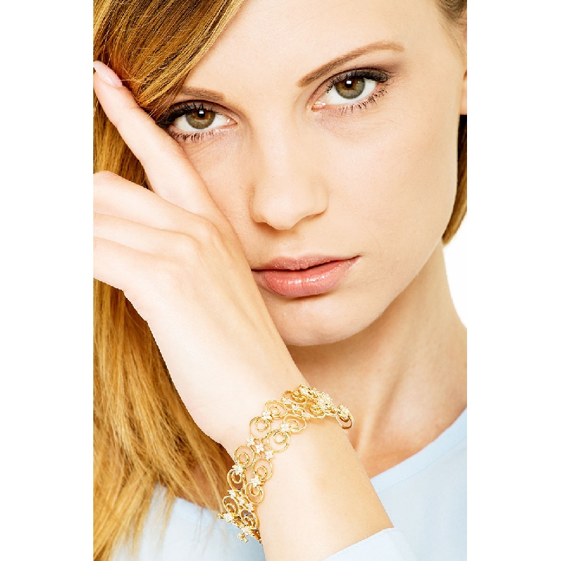 Bracelet en or jaune 18k avec maillons doubles et diamants