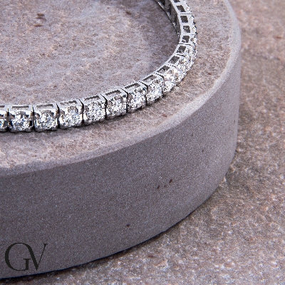 Tennis bracelet en or blanc 18k entouré de diamants