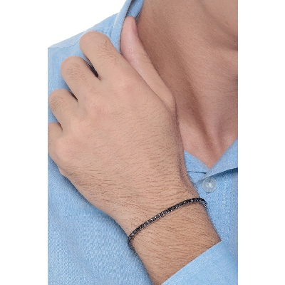 Bracelet Tennis en or blanc 18k avec diamants noirs sur des griffes brunies