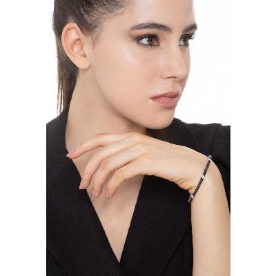 Bracelet tennis en or blanc 18k diamants noirs alternés avec des diamant