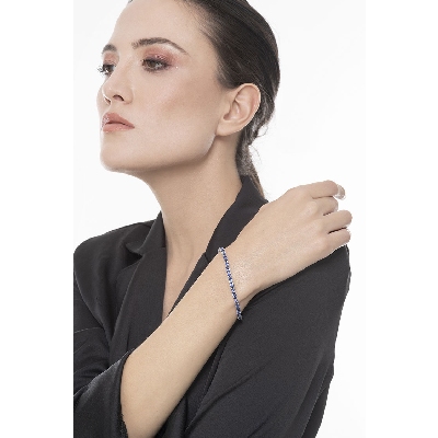 Bracelet tennis en or blanc 18k avec saphir bleu
