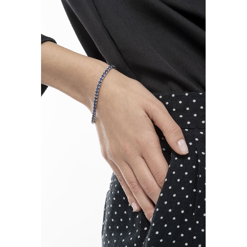 Bracelet tennis en or blanc 18k avec saphir bleu