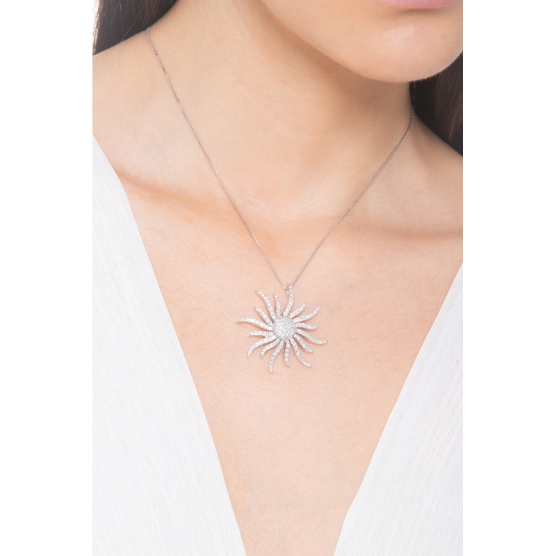 Collier en or blanc 18 ct avec pendentif en forme de soleil