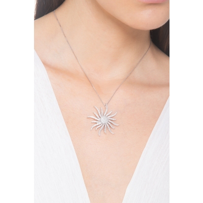 Collier en or blanc 18 ct avec pendentif en forme de soleil