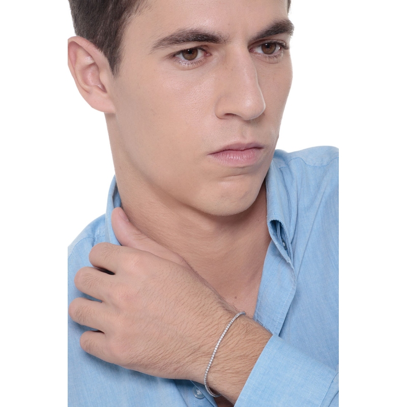 Bracelet tennis à griffes en or blanc 18k et diamants 