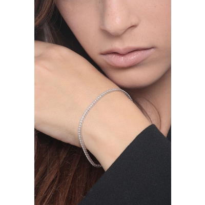 Bracelet tennis à griffes en or blanc 18k et diamants 