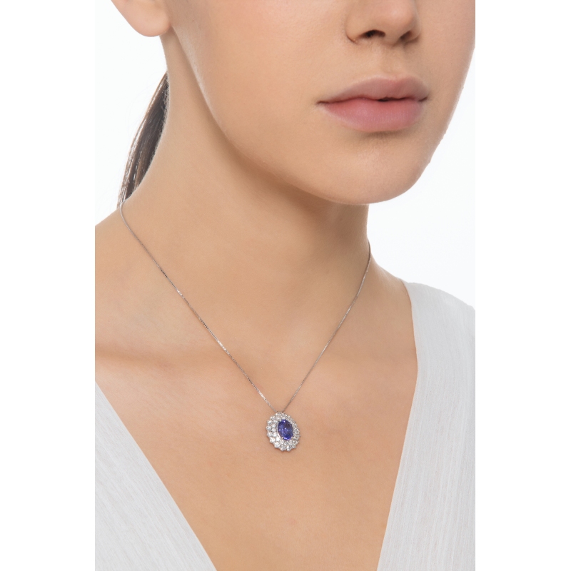  Collier en or blanc 18k avec tanzanite ovale et double halo de diamants