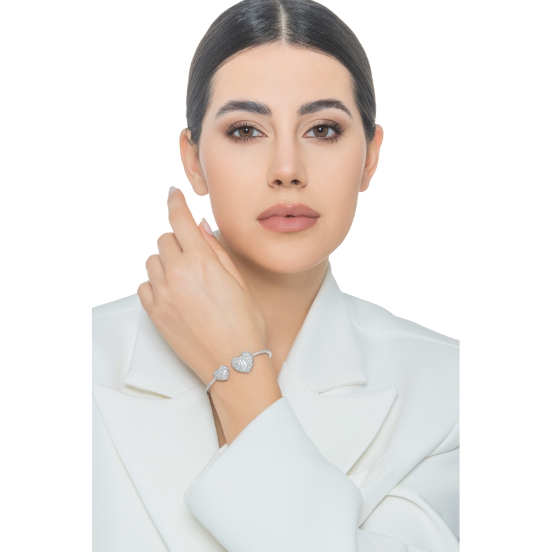 Bracelet semirigide or blanc avec deux cœurs en diamant