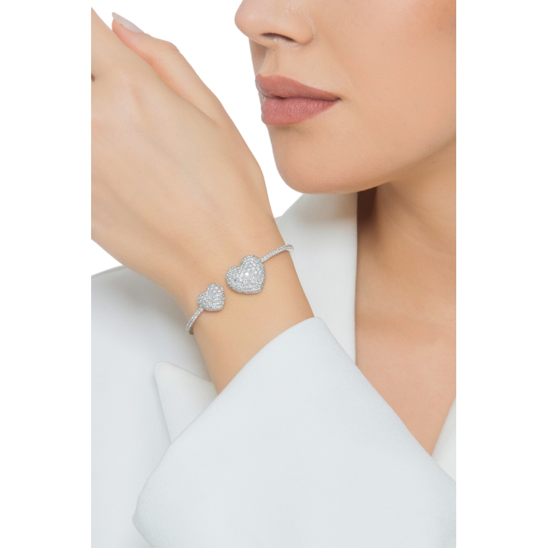 Bracelet semirigide or blanc avec deux cœurs en diamant