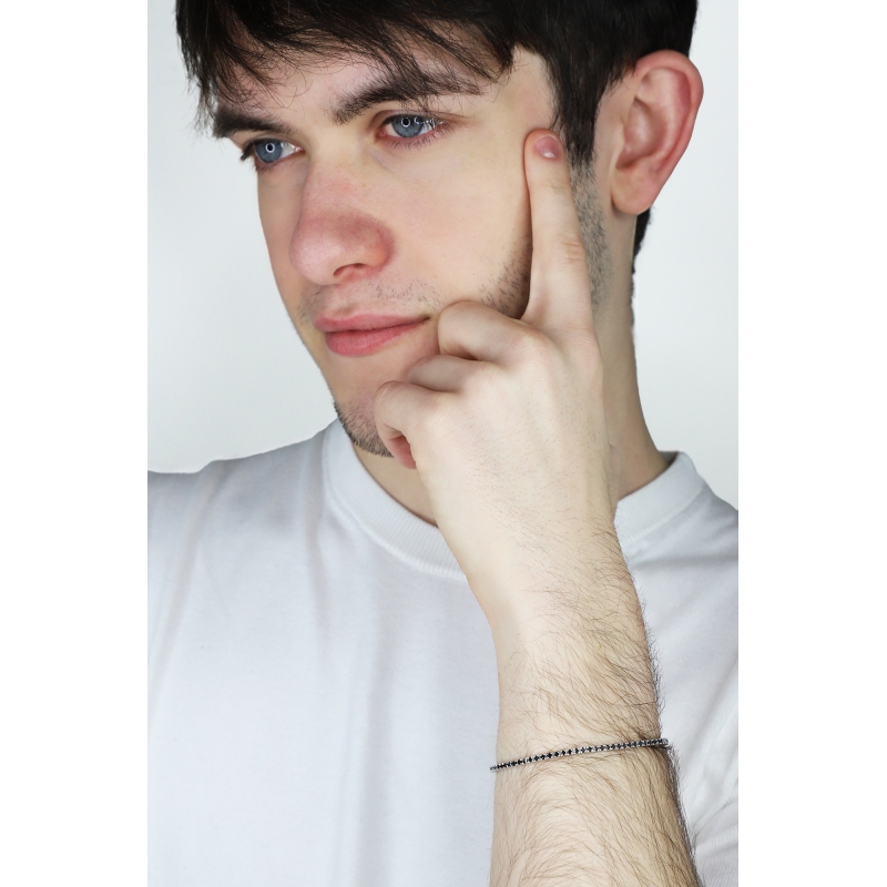 Bracelet tennis en or blanc 750 avec diamants noirs