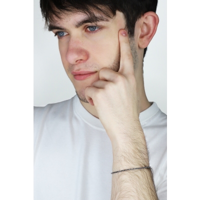 Bracelet tennis en or blanc 750 avec diamants noirs