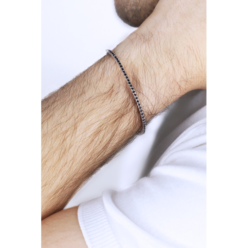 Bracelet tennis en or blanc 750 avec diamants noirs