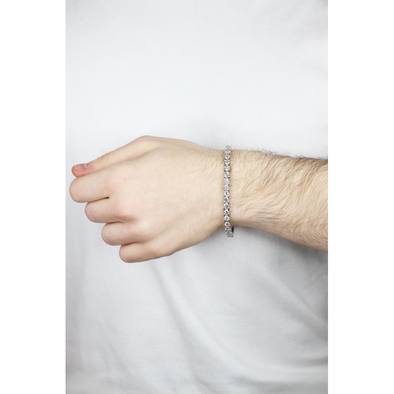 Bracelet tennis griffé en or blanc 18k avec diamants