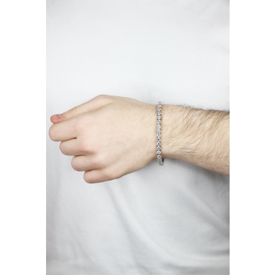 Bracelet tennis griffé en or blanc 18k avec diamants