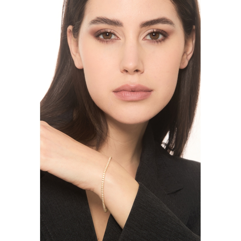 Bracelet Tennis griffé en or jaune 18 carats avec diamants