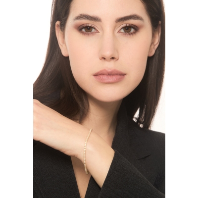 Bracelet Tennis griffé en or jaune 18 carats avec diamants