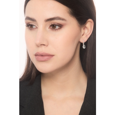 Boucles d'oreilles créoles en or blanc 18k avec une aquamarine ovale 